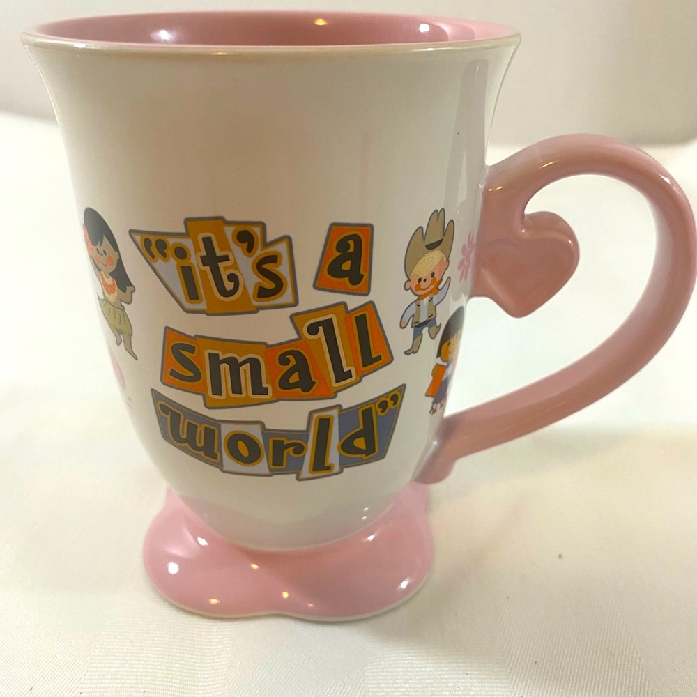 Disney parks it’s a small world joy peace and love coffee mug